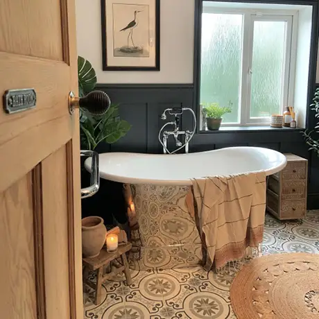 Characterful bathroom with patterned tiles on the floor